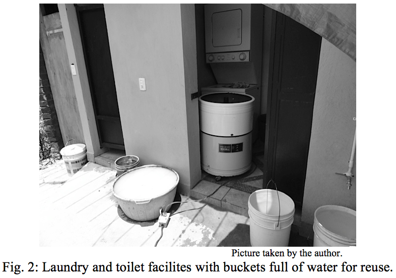 Laundry and toilet facilites with buckets full of water for reuse
